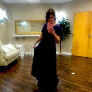 Used only once, beautiful purple dress, no gems.